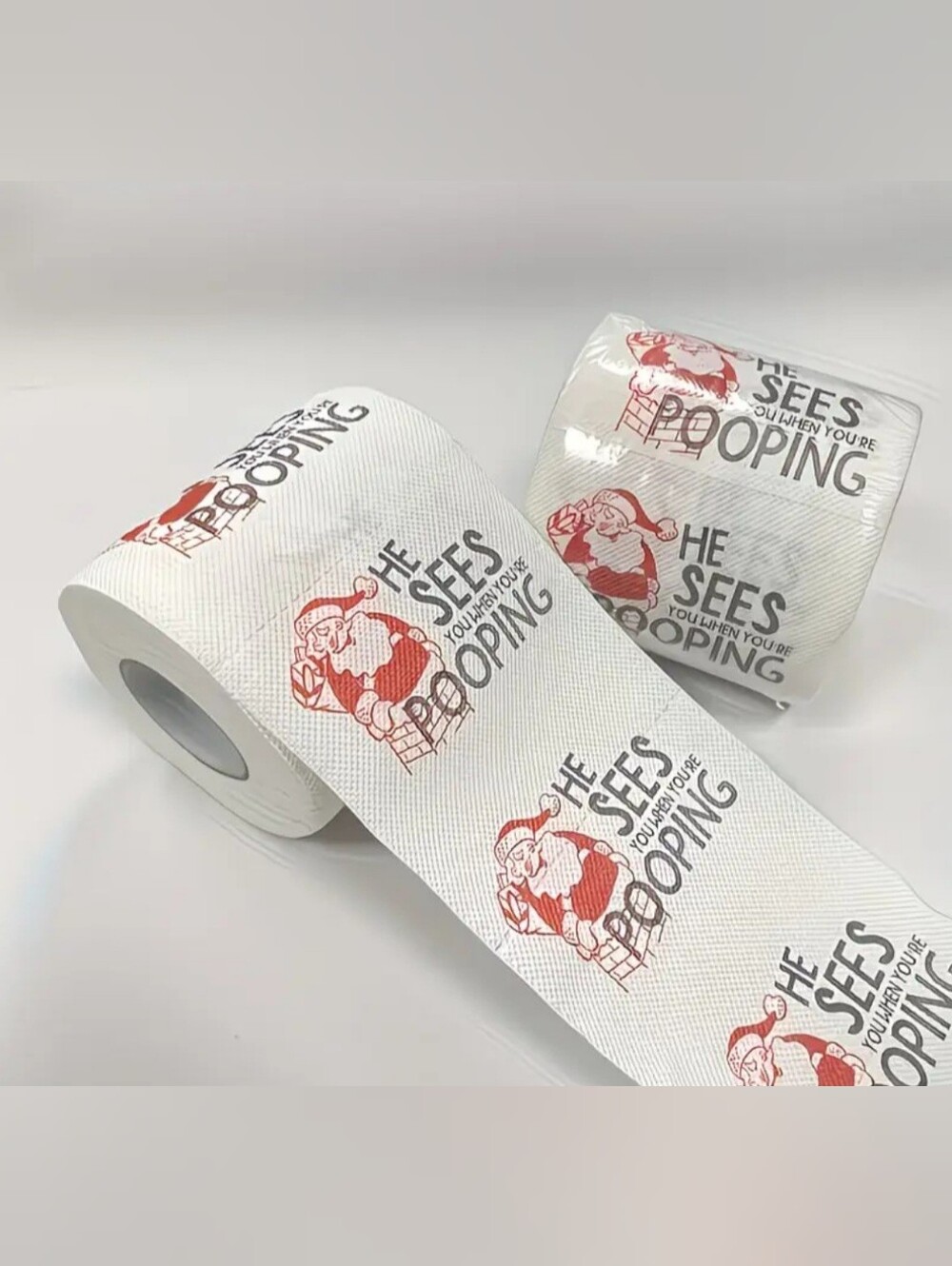Novelty Santa Toilet Paper Roll - White with Red Print